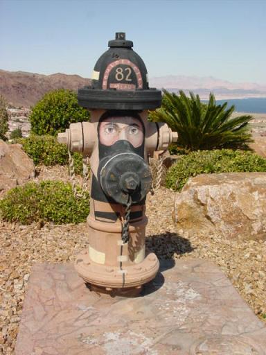 A fire hydrant painted to look like a fireman